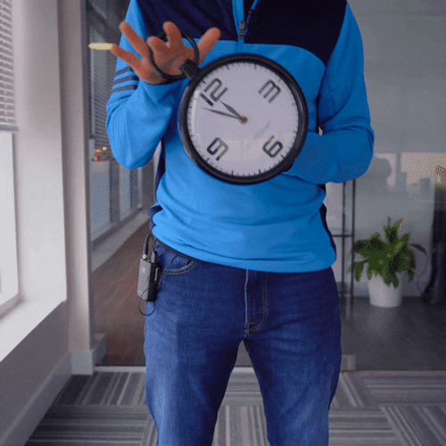 Guy Holding Clock Countdown