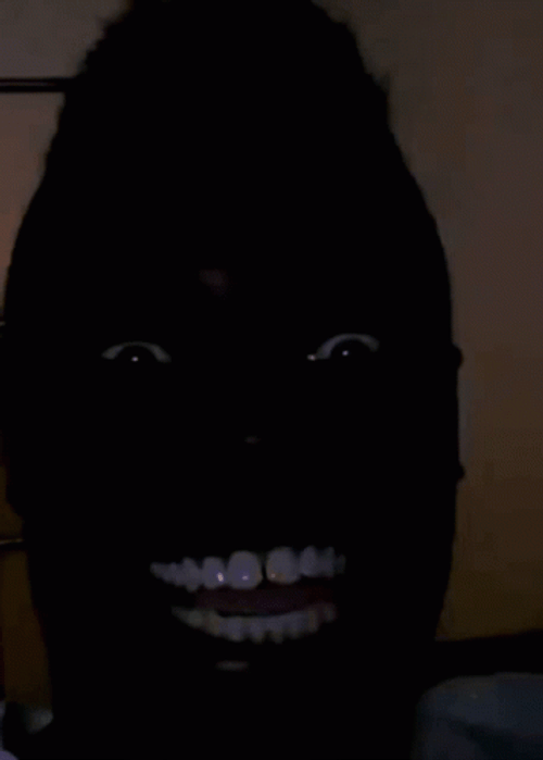 Scary Smiling Black Man