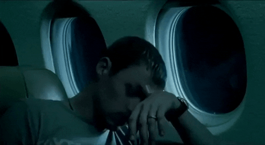 Sleepy Guy On Airplane