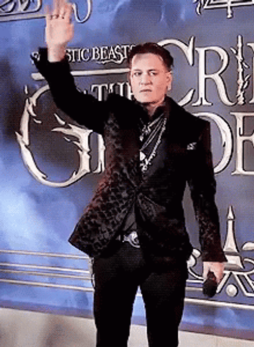 Johnny Depp Fantastic Beast Waving
