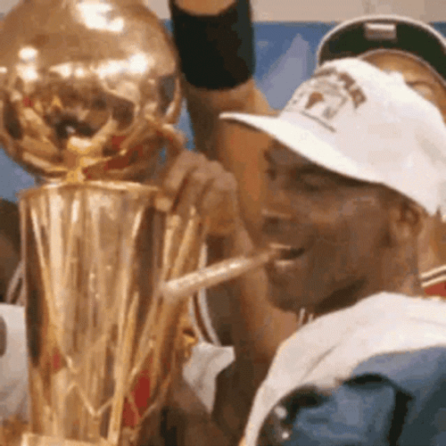 Michael Jordan Showing Off Trophy