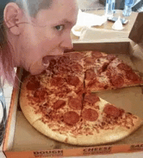 Girl Licking Pizza