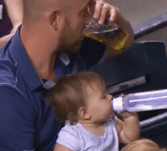 Dad And Baby Drink