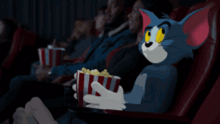 Tom Eating Popcorn Watching Movie