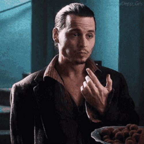 Johnny Depp Licking Fingers