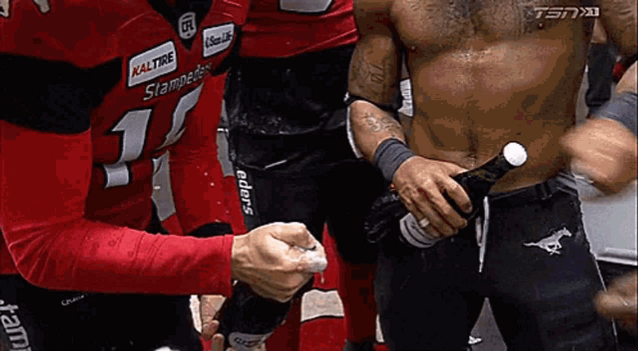 Football Players Showering Champagne