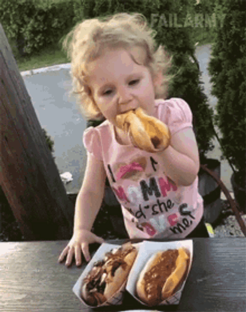 Baby Eating Hot Dog