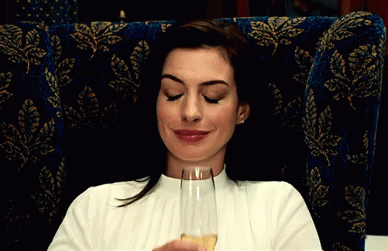 Anne Hathaway Holding Champagne Glass