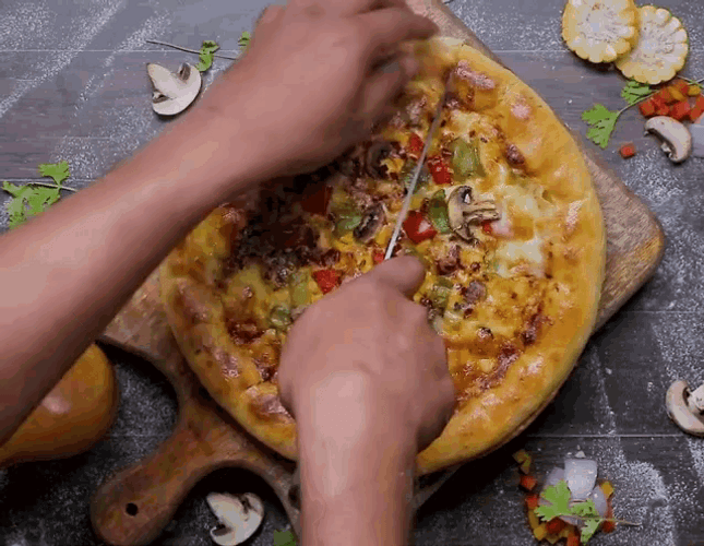 Slicing Vegan Pizza