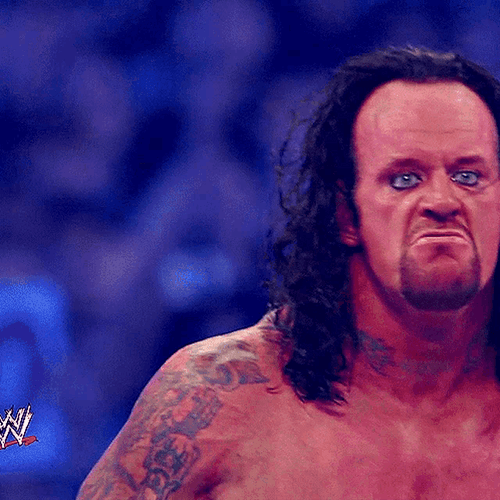The Undertaker Angrily Grinning