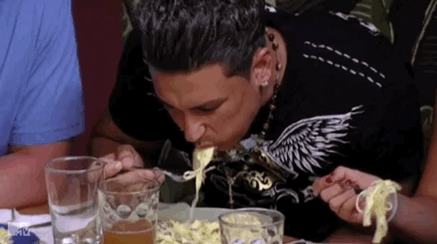 Guy Eating Pasta