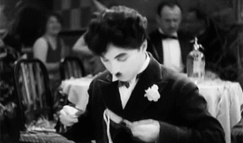 Charlie Chaplin Eating Pasta