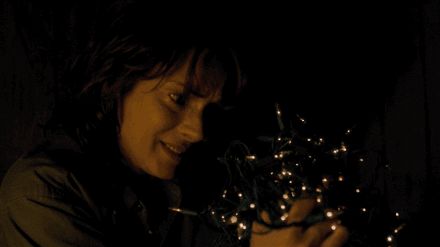 Stranger Things Joyce Byers Holding Lights