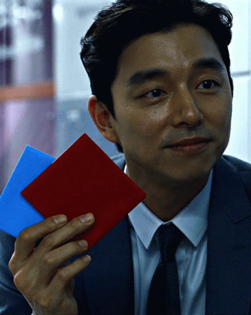 Squid Game Gong Yoo Holding Cards