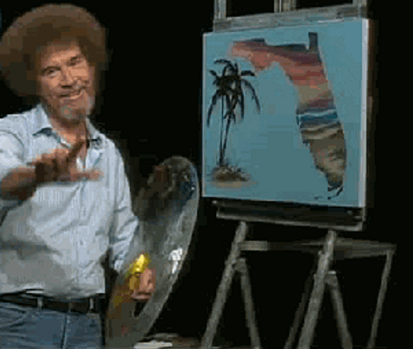 Bob Ross Showing His Art