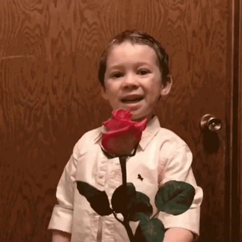 Cute Kid With Rose